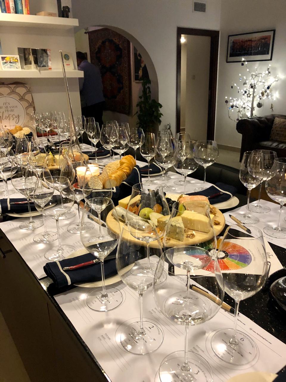 Home tasting table set with cheese